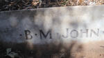 JOHN B.M.