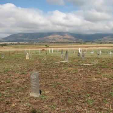 1. Overview on the cemetery with the military cemetery in the background