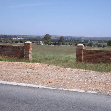 1. On the R324  the entrance gate to the cemetery