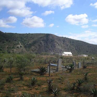 5. The cemetery with the farmhouse at the background